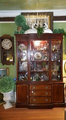 This gorgeous antique hutch full of fine china would make a great addition to any home! 